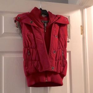 Red puffy vest with fur hood